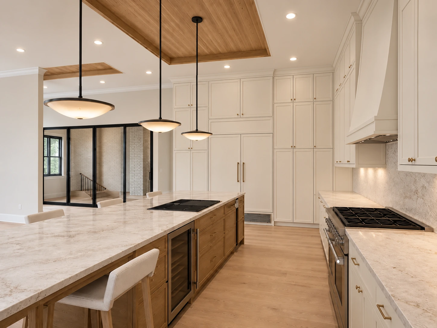 Kitchen design concept at 10 Legend Lane with an oak island, natural stone, and ceiling-height cabinetry